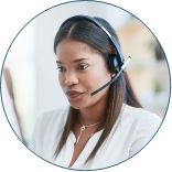 Customer support representative wearing a headset.